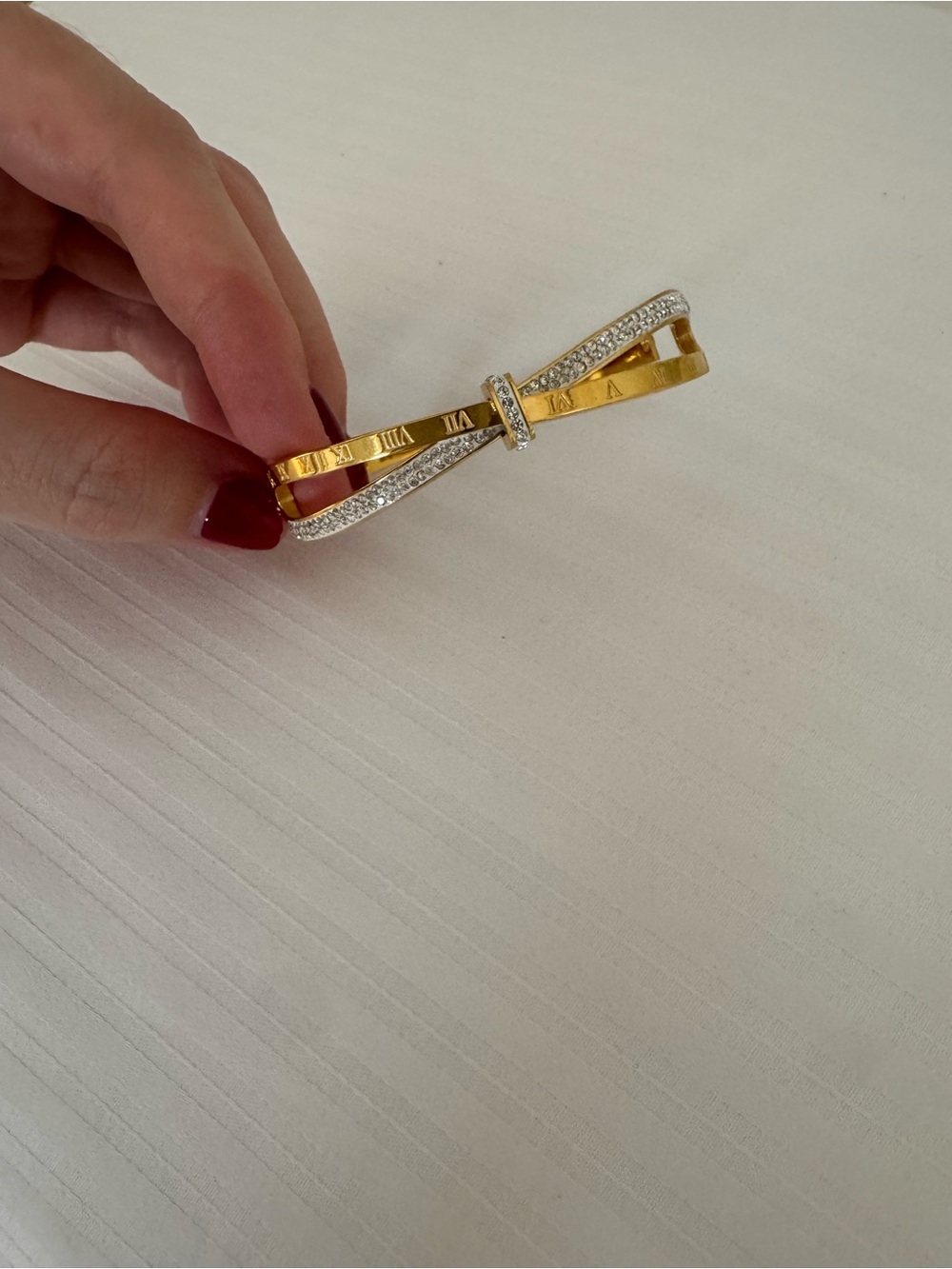 Gold and Silver Bow Bangle with Roman Numeral Accent